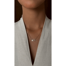 Load image into Gallery viewer, 18-karat rose gold Triple Arabic letter necklace with a natural diamond on a 18-karat rose gold chain.