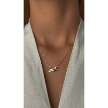 Load image into Gallery viewer, 18-karat yellow gold Double Arabic letter necklace with a natural diamond on a yellow gold chain.
