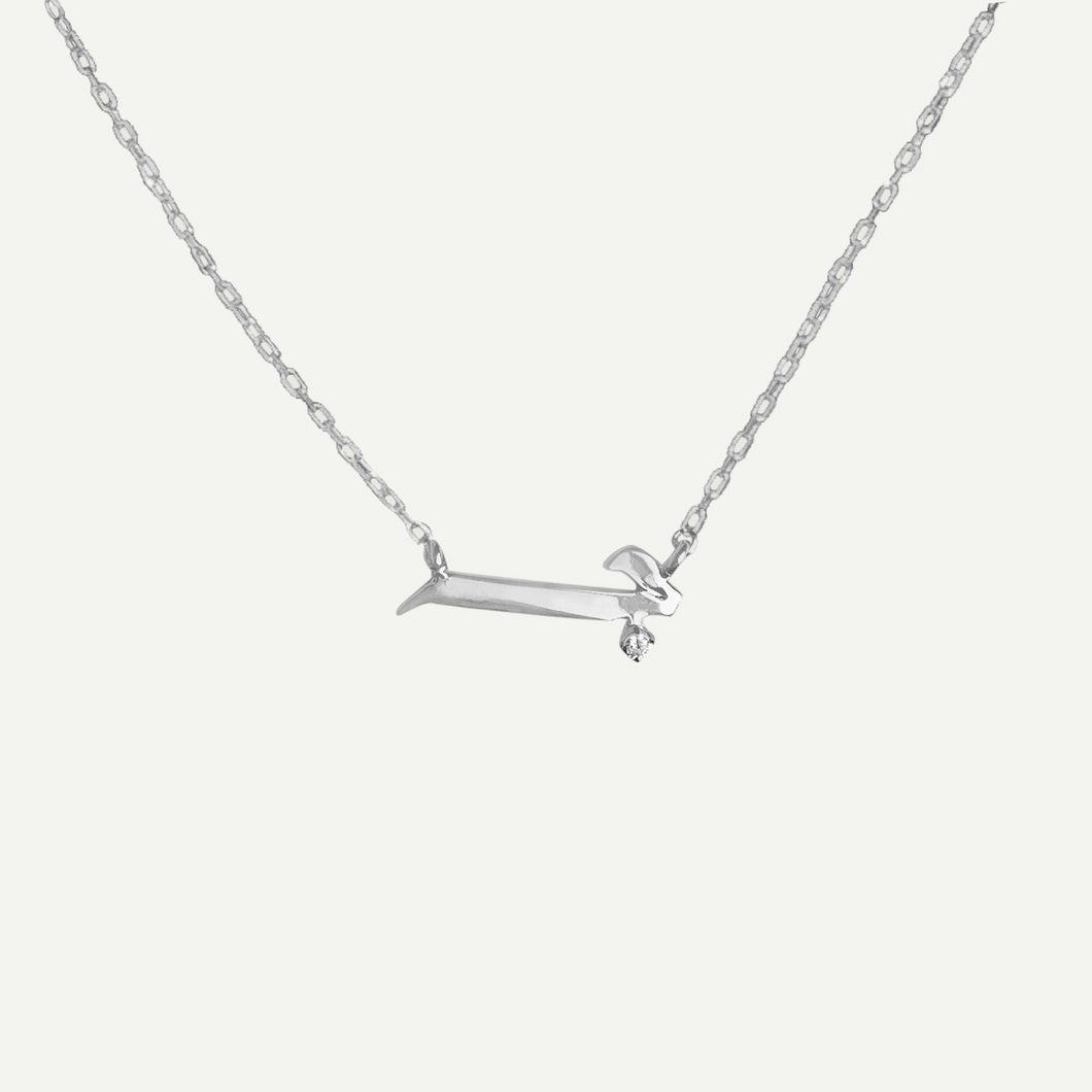 Arabic Letter Necklace in 18 karat White Gold with a round natural Diamond for women.