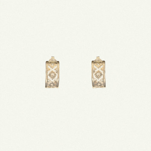 18 karat solid gold hoop earrings in traditional design for women.