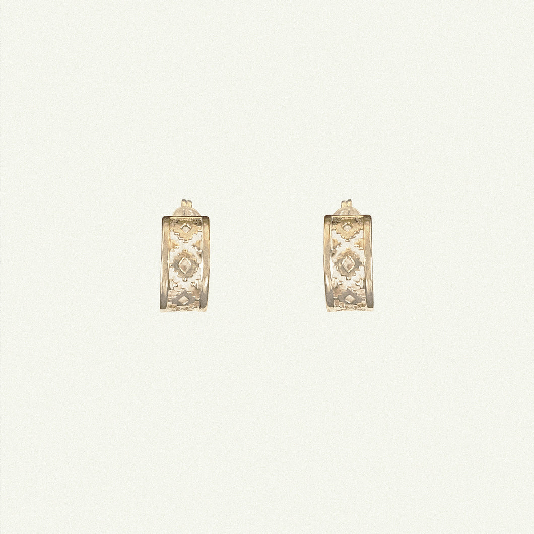 18 karat solid gold hoop earrings in traditional design for women.